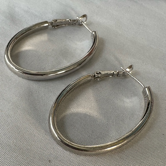 Three silvertone hoops and ear hugger - Picture 5 of 5